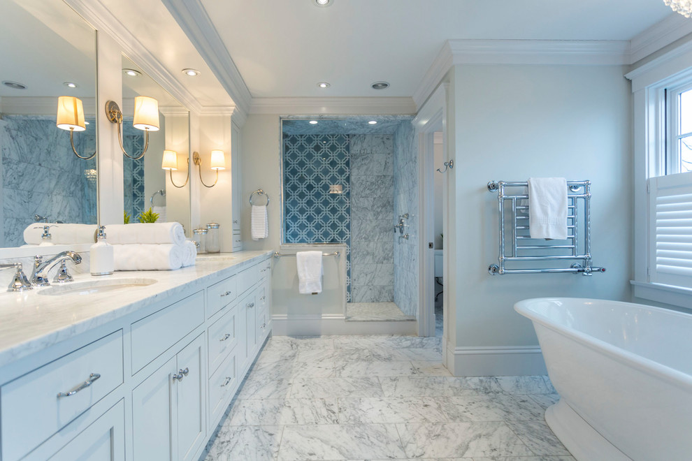 Design ideas for a beach style bathroom in Manchester with shaker cabinets, white cabinets, a freestanding tub, an alcove shower, brown walls, an undermount sink, white floor, an open shower and white benchtops.