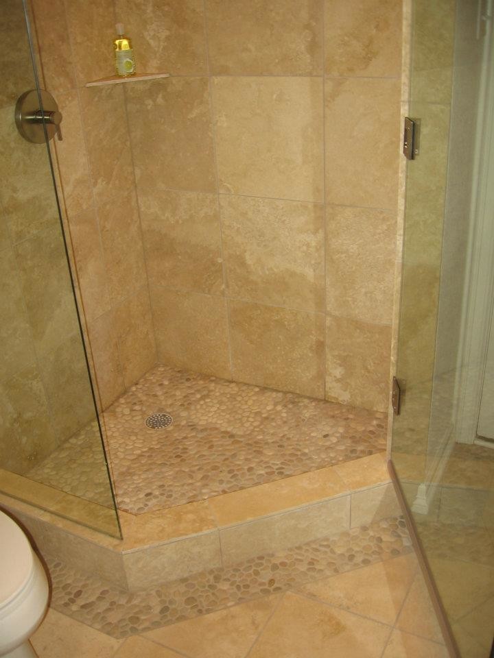 Photo of a large transitional master bathroom in Dallas with raised-panel cabinets, white cabinets, a drop-in tub, an alcove shower, a two-piece toilet, beige tile, stone tile, white walls, marble floors, an undermount sink and granite benchtops.