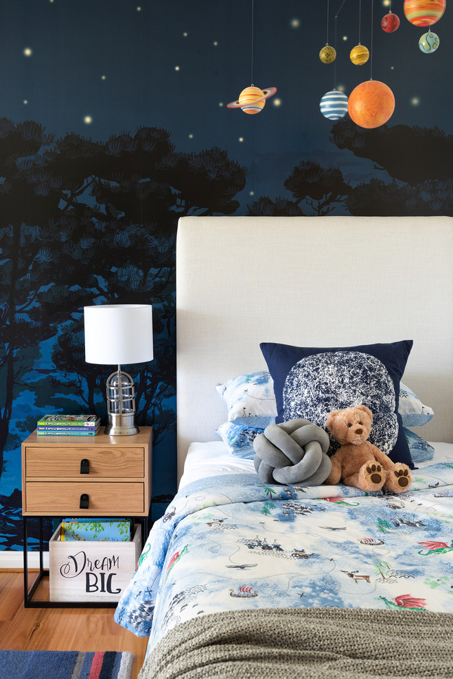 Photo of a contemporary kids' room in Perth with blue walls, medium hardwood floors and brown floor.