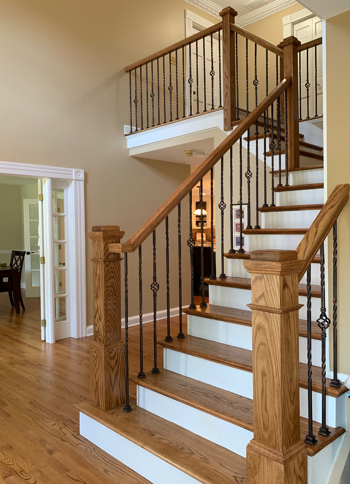 This is an example of a medium sized traditional staircase in Philadelphia.