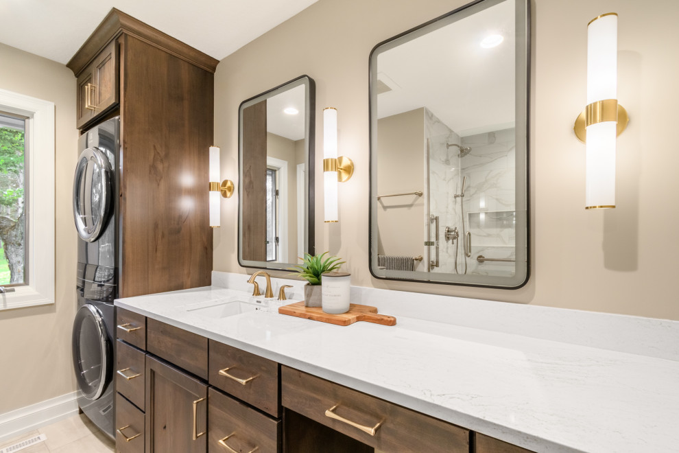 Inspiration for a transitional porcelain tile and beige floor bathroom remodel in Minneapolis with recessed-panel cabinets, dark wood cabinets and beige walls