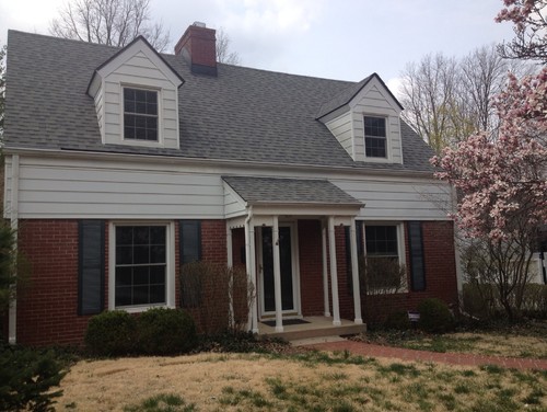 Awkward siding on Cape Cod style house