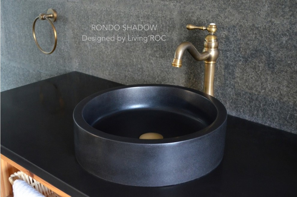 This is an example of a small contemporary bathroom in London with a vessel sink.