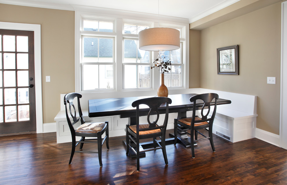Design ideas for a contemporary dining room in Minneapolis with beige walls and dark hardwood floors.