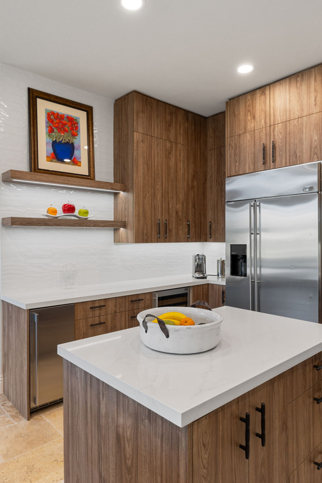 Example of a mountain style l-shaped slate floor and beige floor enclosed kitchen design with a single-bowl sink, flat-panel cabinets, medium tone wood cabinets, quartzite countertops, white backsplash, glass sheet backsplash, stainless steel appliances, a peninsula and white countertops