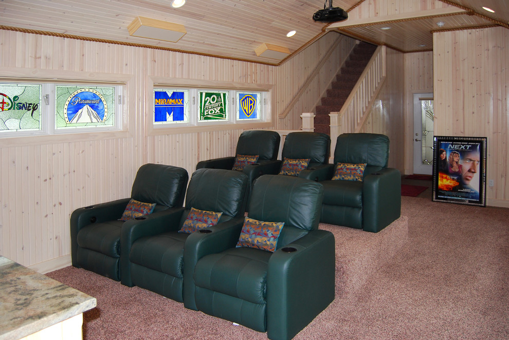 Design ideas for a small eclectic enclosed home theatre in Cleveland with carpet and a projector screen.
