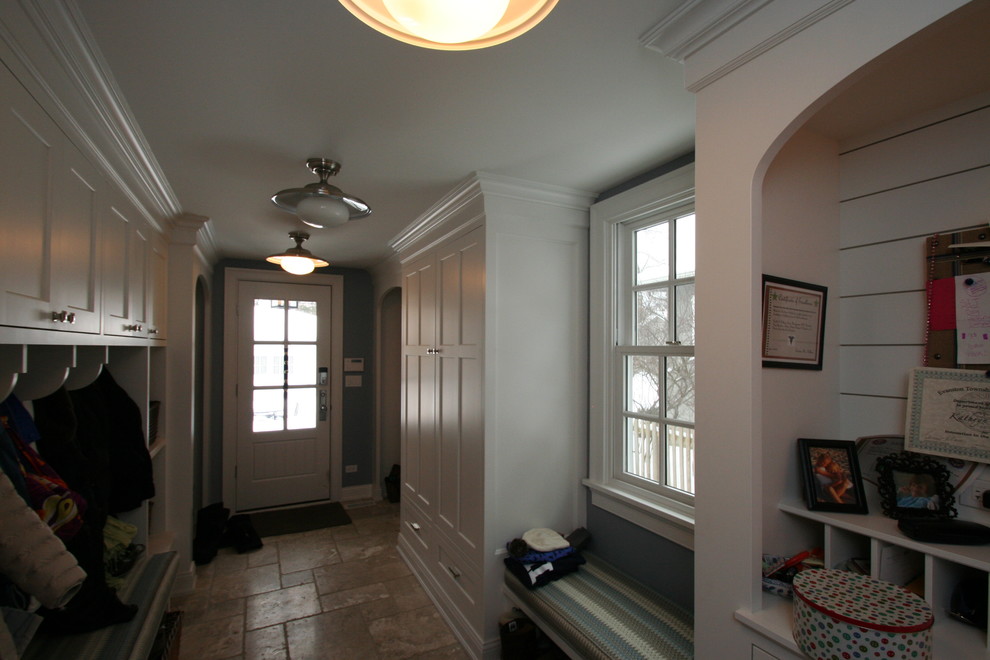 Kitchen - large transitional ceramic tile kitchen idea in Chicago with white walls and a white front door