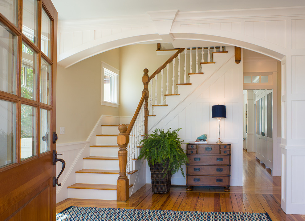 This is an example of a traditional entryway in Providence with beige walls.