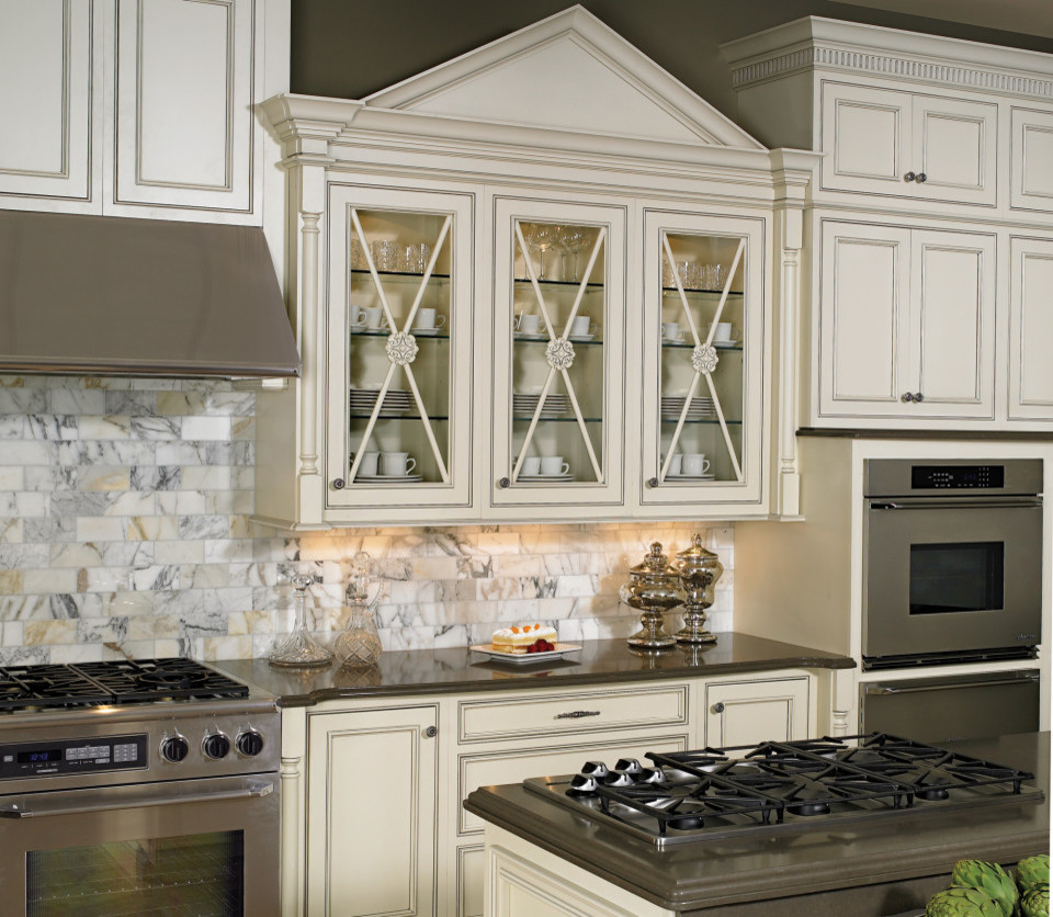 Mid-sized transitional kitchen photo with beaded inset cabinets, beige cabinets, quartz countertops, multicolored backsplash, marble backsplash, stainless steel appliances, an island and black countertops