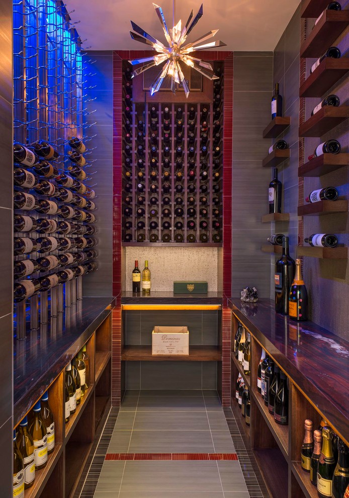 Design ideas for a contemporary wine cellar in Dallas with storage racks.