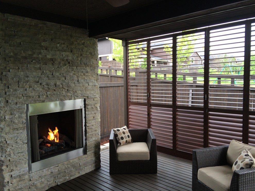 Mid-sized modern backyard verandah in Melbourne with decking.