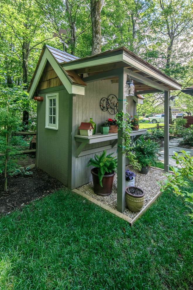 Shed - mid-sized farmhouse two-story and detached gray shed idea in Charlotte with a shingle roof