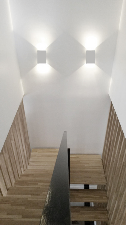 Inspiration for a scandinavian wood u-shaped staircase in Bordeaux with open risers.