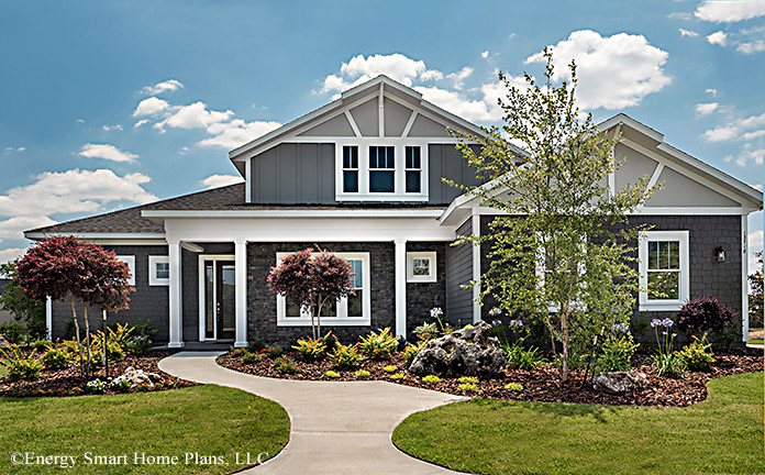 Mid-sized transitional gray two-story mixed siding exterior home photo in Miami