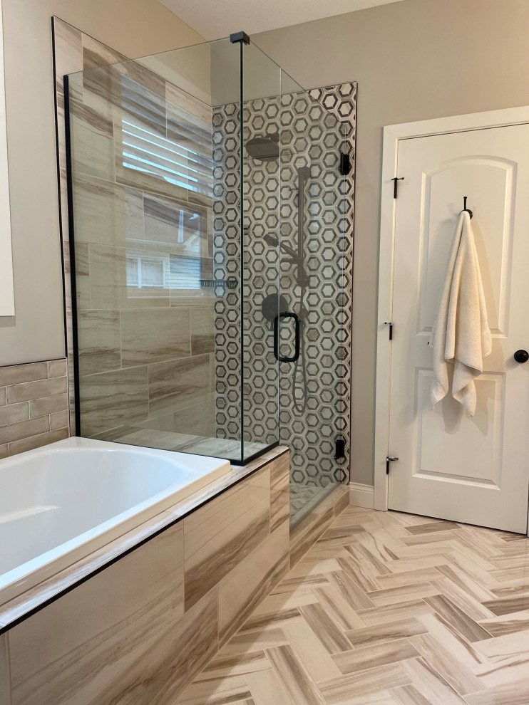 Mid-sized transitional master bathroom in Minneapolis with shaker cabinets, dark wood cabinets, a drop-in tub, an open shower, a bidet, beige tile, grey walls, ceramic floors, engineered quartz benchtops, white benchtops, a shower seat, a double vanity and a built-in vanity.