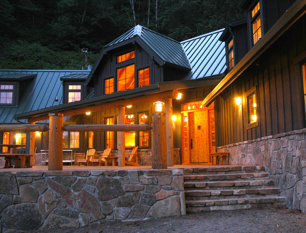 Inspiration for a huge rustic deck remodel with a roof extension