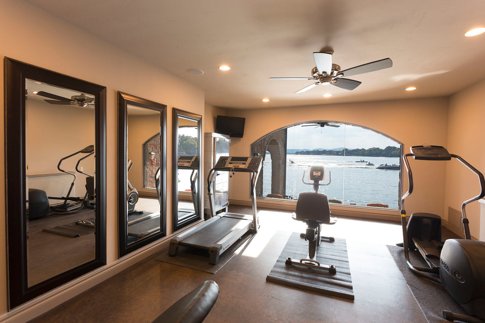 Photo of a large transitional multipurpose gym in Austin with white walls, brown floor and cork floors.
