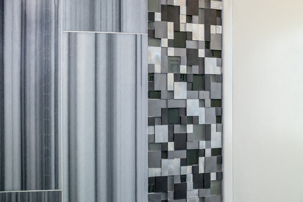 Alcove shower - mid-sized transitional master gray tile and metal tile porcelain tile and gray floor alcove shower idea in Phoenix with raised-panel cabinets, white cabinets, a one-piece toilet, brown walls, an undermount sink and granite countertops