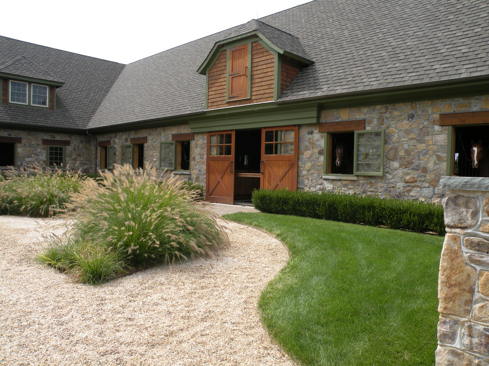 Example of a farmhouse home design design in Philadelphia