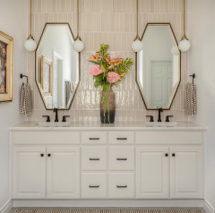 Warm and Refined Bathroom With a Striking Green Shower