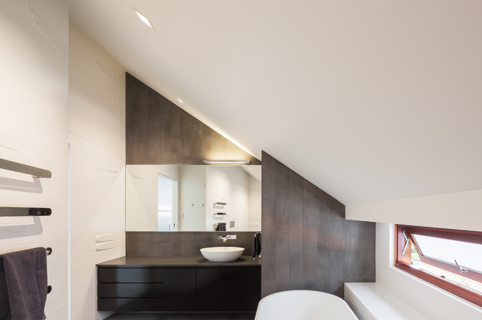 Design ideas for a contemporary master bathroom in Sydney with a vessel sink, flat-panel cabinets, medium wood cabinets, engineered quartz benchtops, an open shower, a wall-mount toilet, gray tile, ceramic tile, white walls and ceramic floors.