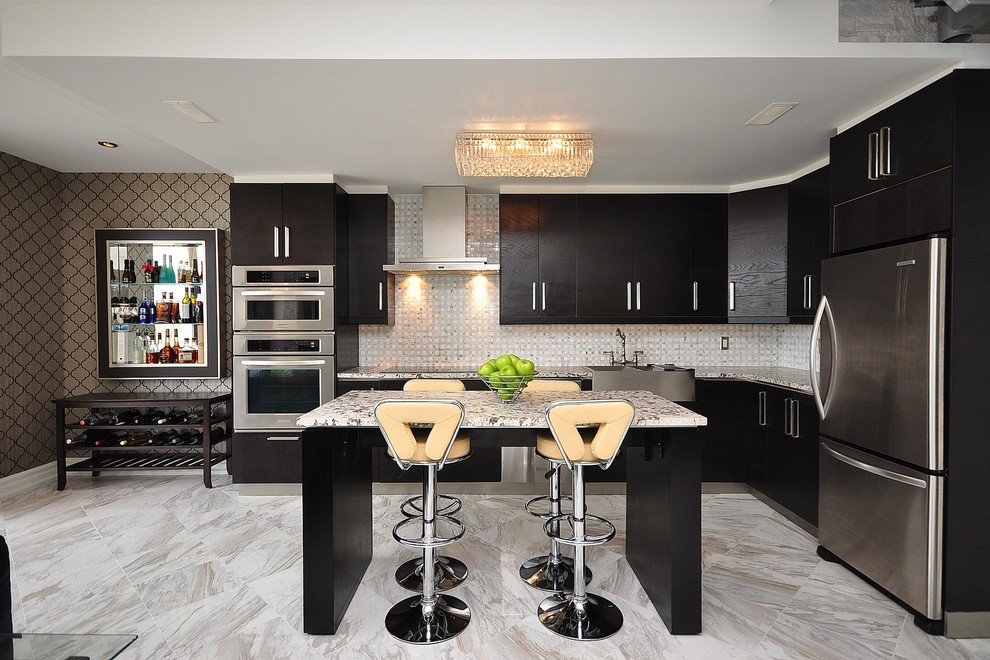 Photo of a contemporary l-shaped open plan kitchen in Toronto with a farmhouse sink, dark wood cabinets, white splashback and stainless steel appliances.