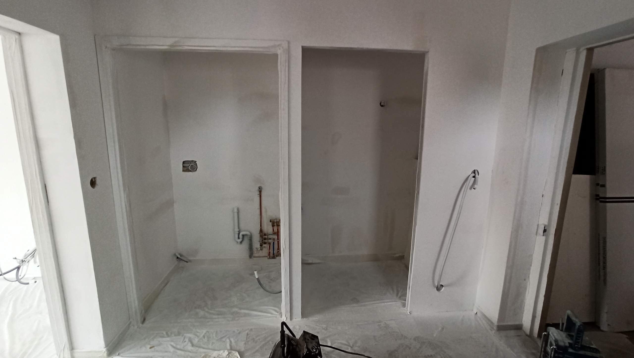 Transformation d'une chambre parentale en pièce de vie/cuisine