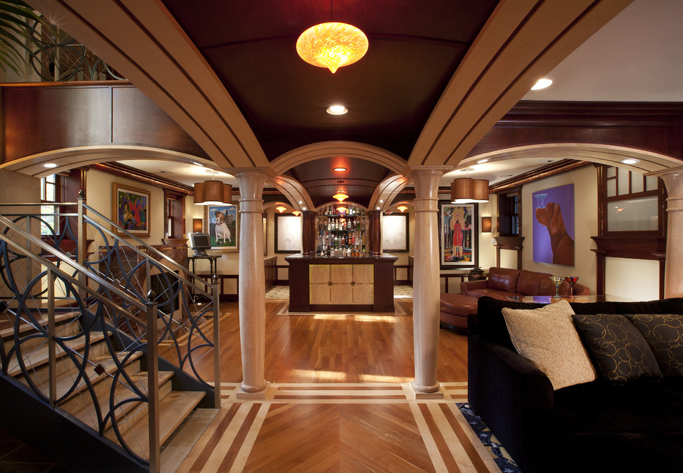 Design ideas for a large eclectic home bar in Chicago with medium hardwood floors.