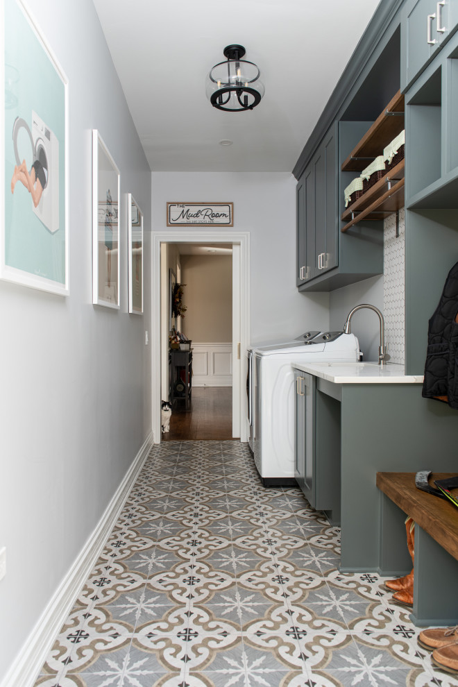 This is an example of a transitional laundry room in Chicago.