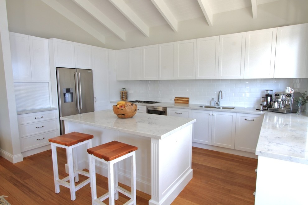 This is an example of a mid-sized beach style kitchen in Sydney.