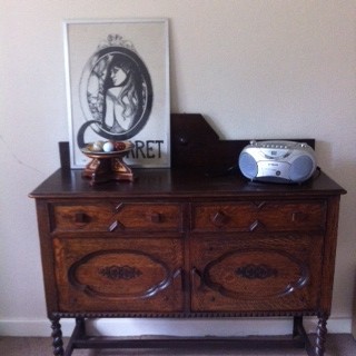Decluttered reception room used as a storage room