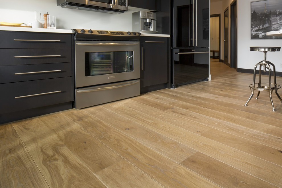 Example of a transitional light wood floor home design design in Calgary