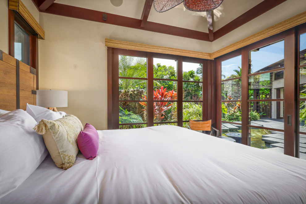 ハワイにあるトロピカルスタイルのおしゃれな寝室のインテリア