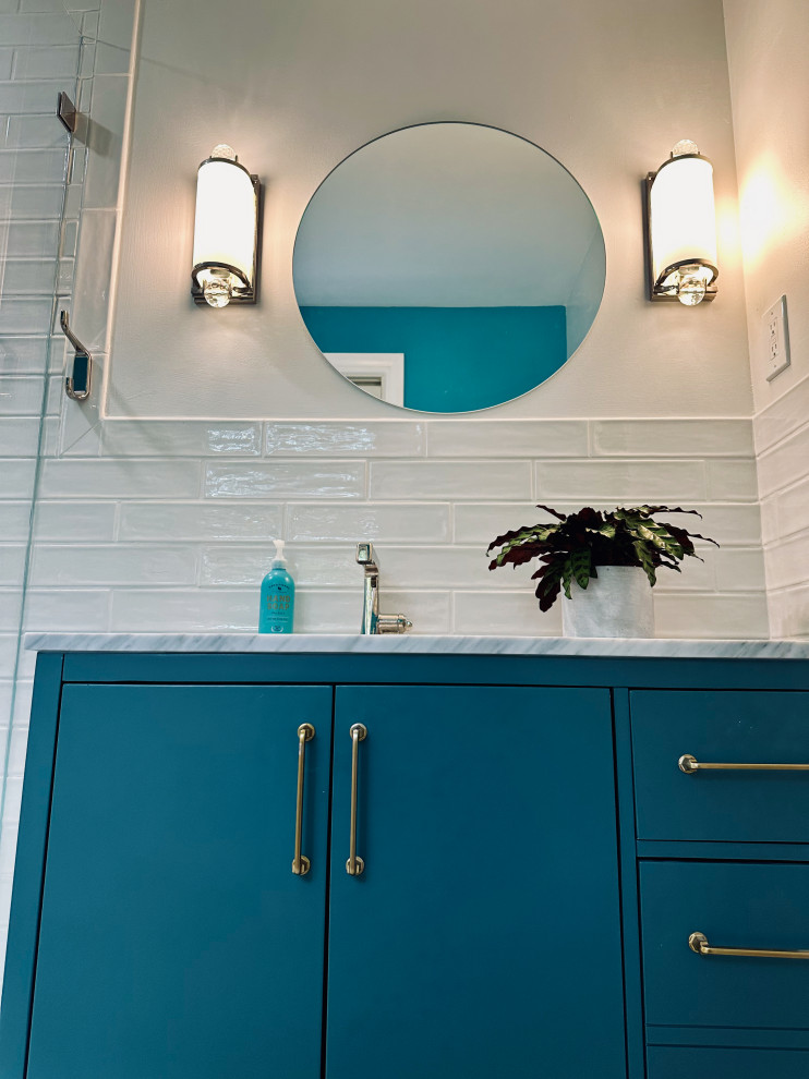 Design ideas for a small contemporary ensuite bathroom in Wilmington with flat-panel cabinets, turquoise cabinets, white tiles, ceramic tiles, a submerged sink, marble worktops, multi-coloured worktops, a single sink and a freestanding vanity unit.