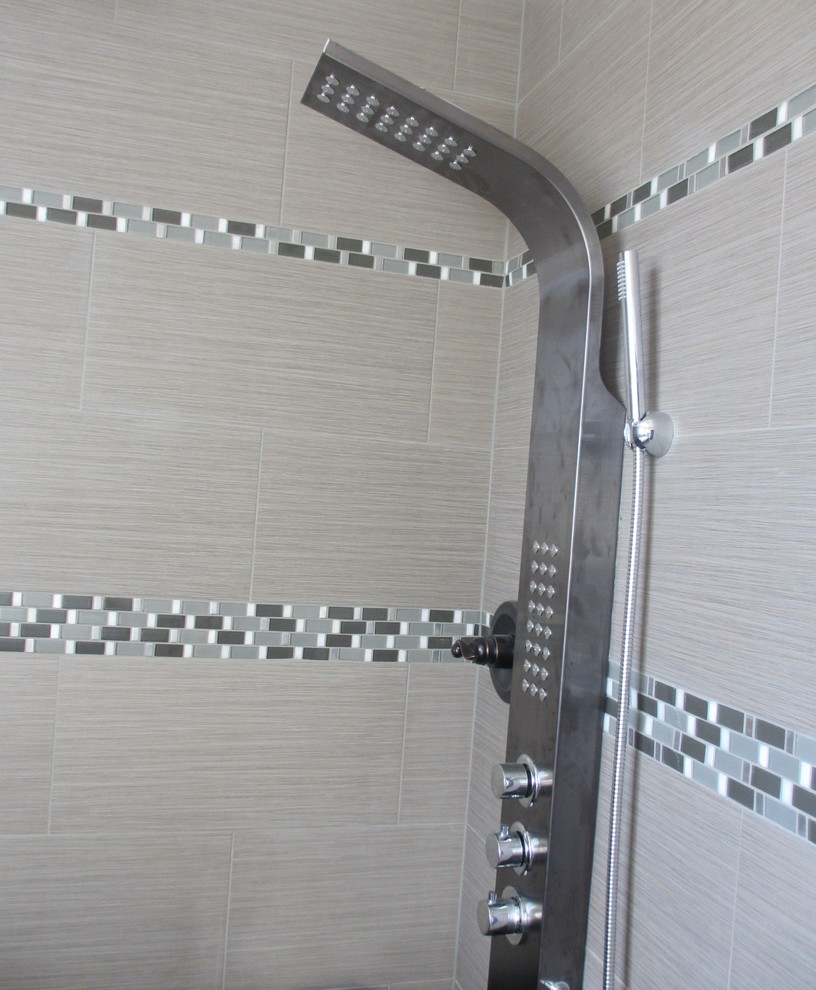 Bathroom - transitional beige tile and stone tile bathroom idea