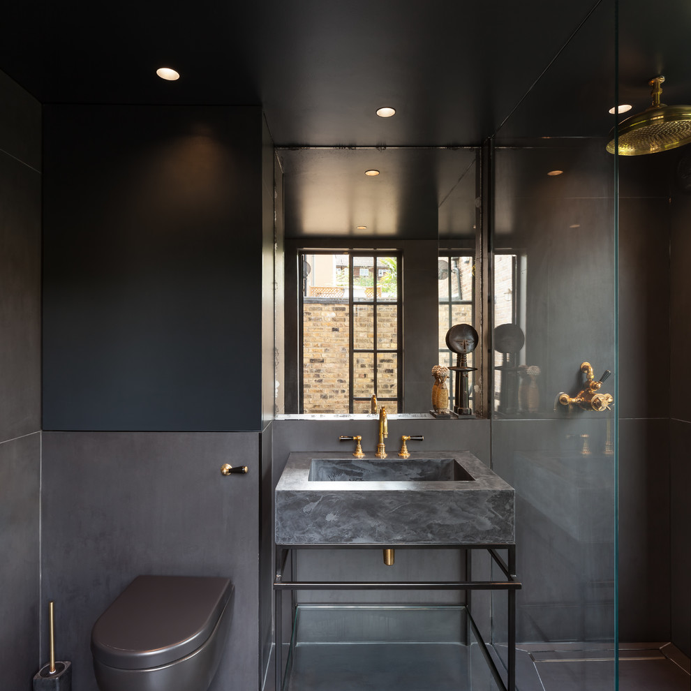 Design ideas for a small contemporary bathroom in London with open cabinets, black cabinets, an open shower, a one-piece toilet, black tile, porcelain tile, black walls, porcelain floors, a console sink, concrete benchtops, black floor and an open shower.