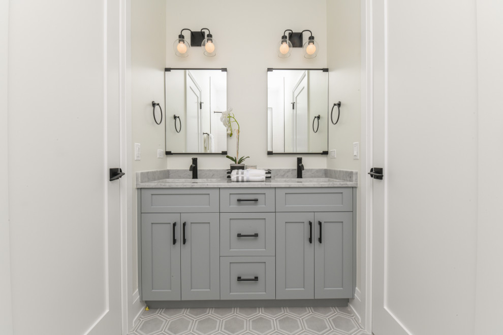Large transitional 3/4 double-sink bathroom photo in Chicago with shaker cabinets, gray cabinets, white countertops and a built-in vanity