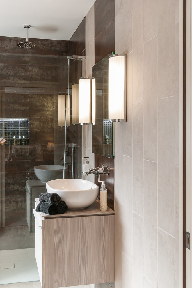 Inspiration for a transitional master bathroom in Berkshire with a curbless shower, a one-piece toilet and black tile.