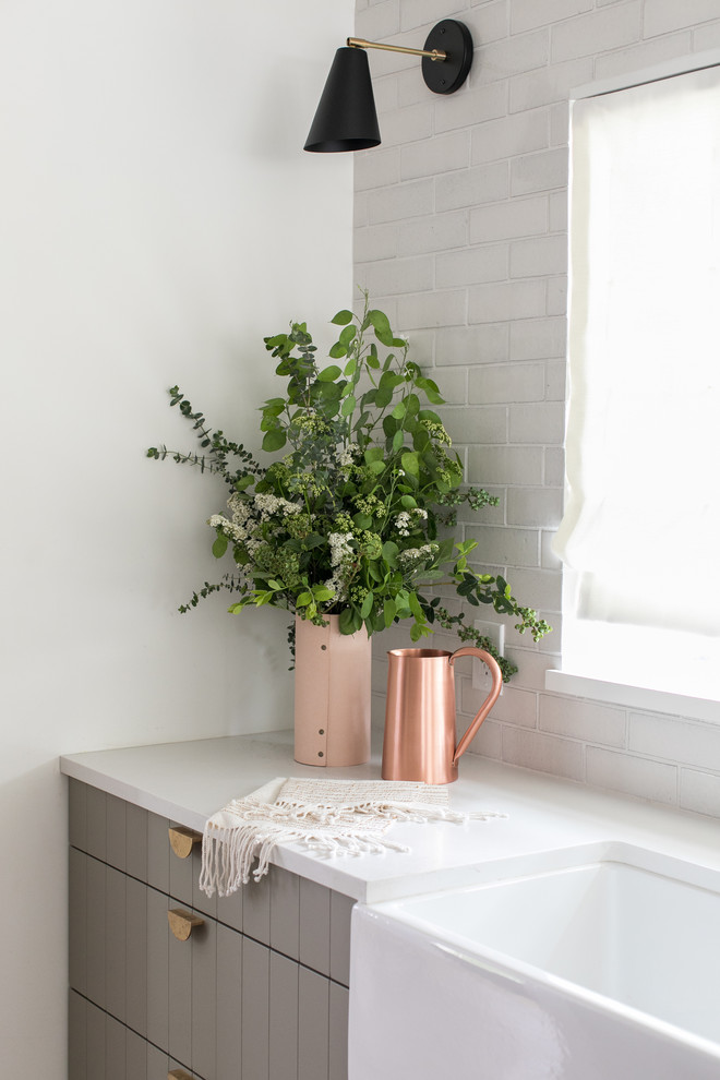 Transitional kitchen photo in San Francisco with white backsplash and brick backsplash