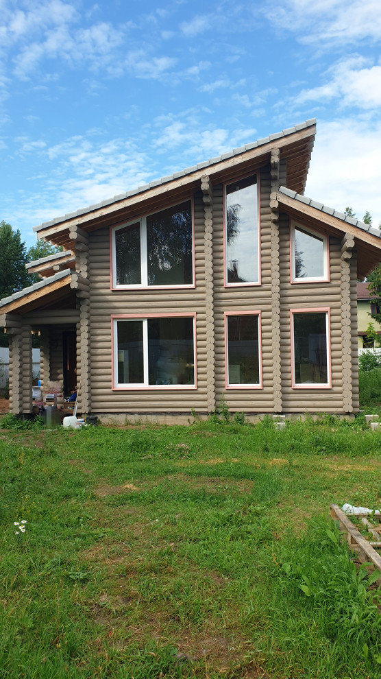 Дача модерн из оцилиндрованного бревна 141 м.кв.