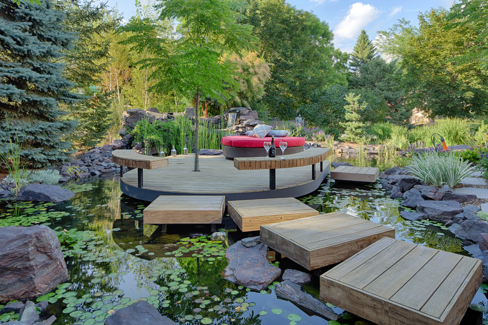 Inspiration for an asian deck in Minneapolis with a water feature.