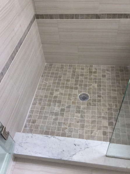 Design ideas for a large contemporary master bathroom in Detroit with dark wood cabinets, a drop-in tub, a corner shower, brown tile, pebble tile, grey walls, porcelain floors, an undermount sink, granite benchtops, brown floor and an open shower.