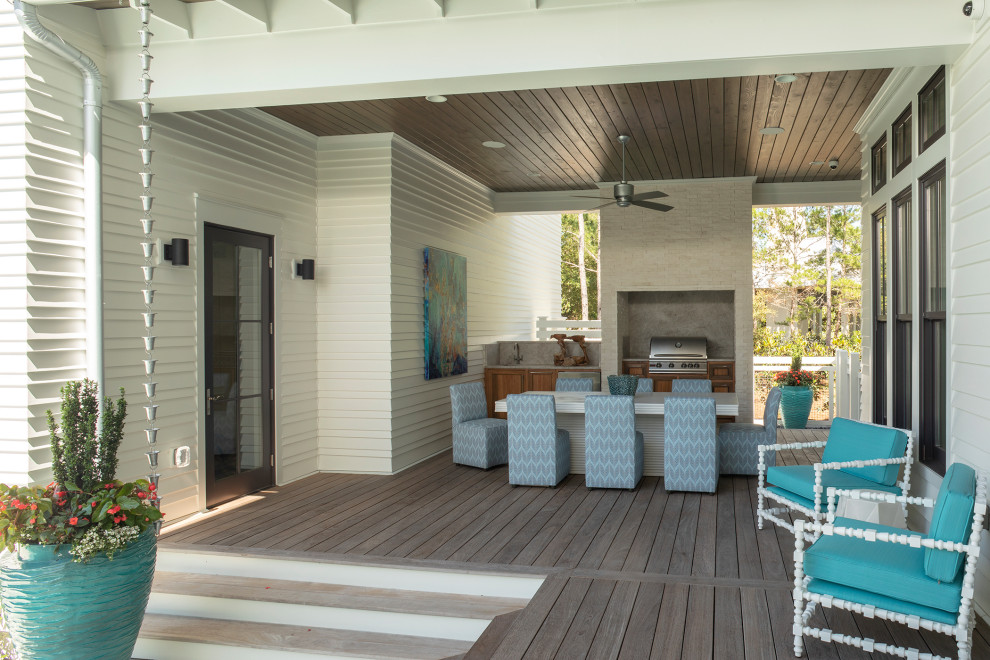 Inspiration for a large coastal back veranda in Other with an outdoor kitchen, decking and a roof extension.