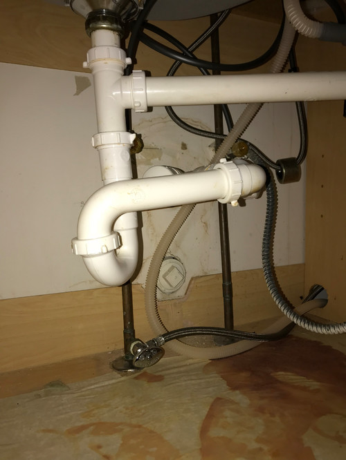 Plumbing In Kitchen Sink Base Cabinet, Cutting Kitchen Cabinets For Pipes
