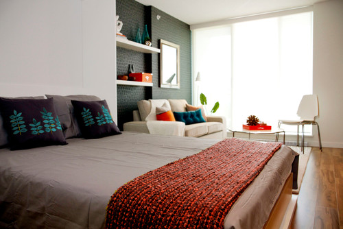 Wall bed in small living space.