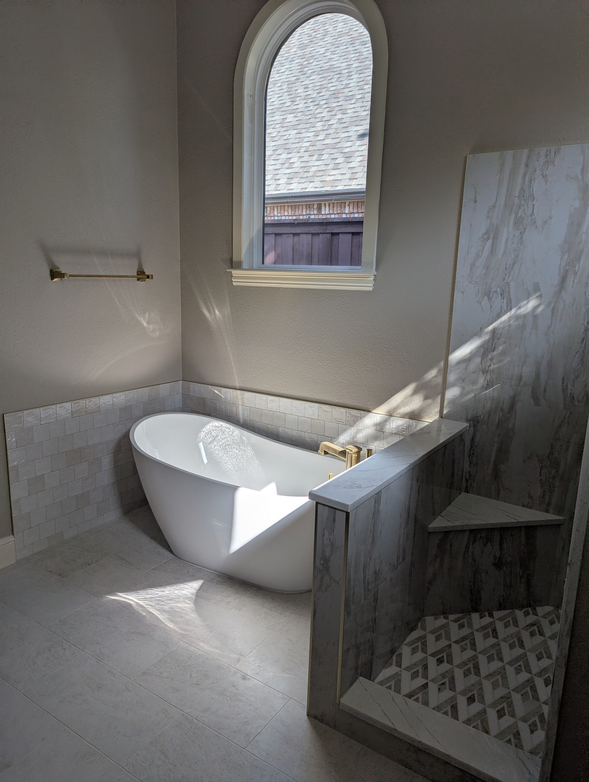 Almost finished with Plano bathroom remodeling, check out the light over the bathtub, the beautiful tile for the walk-in shower.