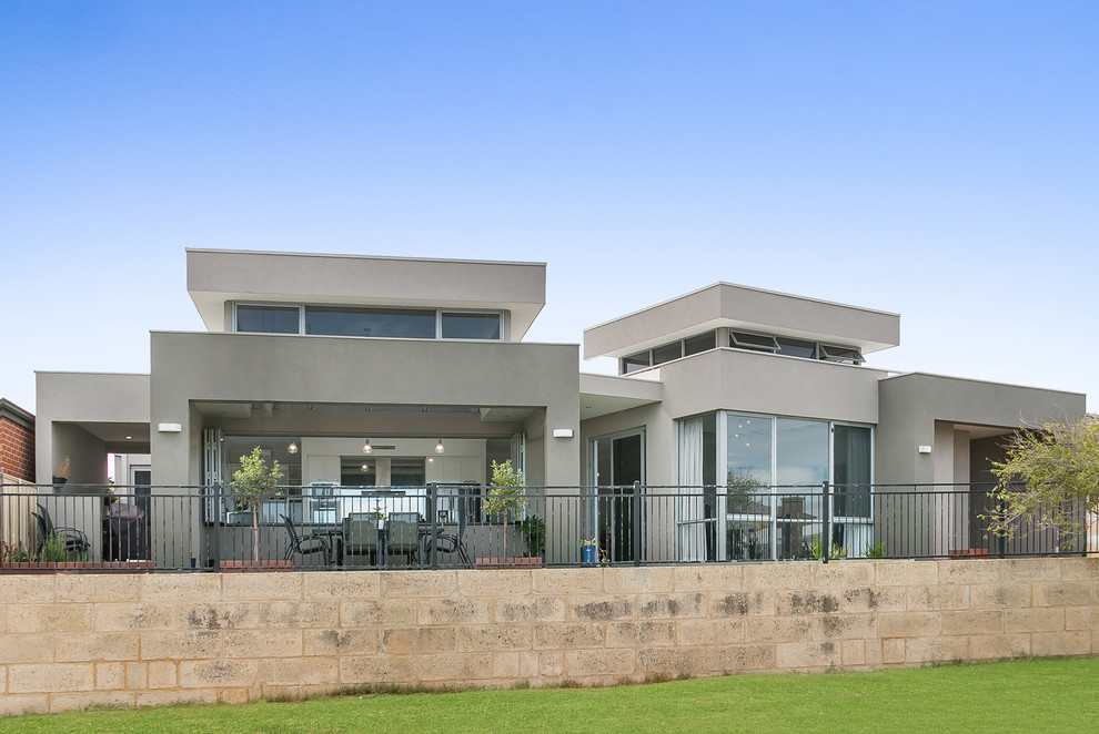 This is an example of a mid-sized modern one-storey brick grey house exterior in Perth.