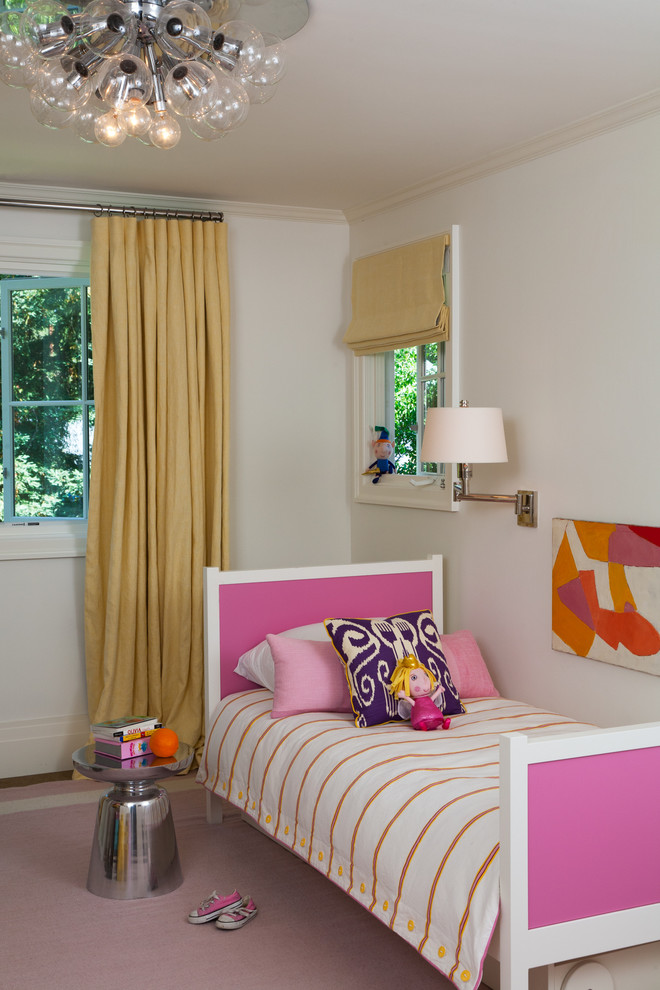Photo of a small contemporary kids' bedroom for kids 4-10 years old and girls in San Francisco with white walls and carpet.