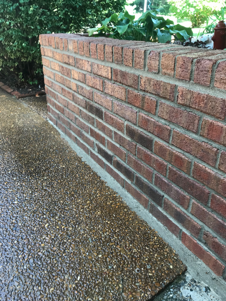 Brick Retaining Wall Restoration from Previous Failed Mortar Matching Repairs