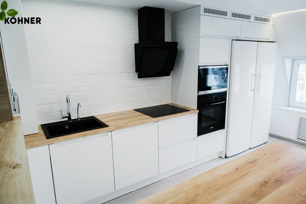 Кухня в скандинавском стиле в мансардной квартире